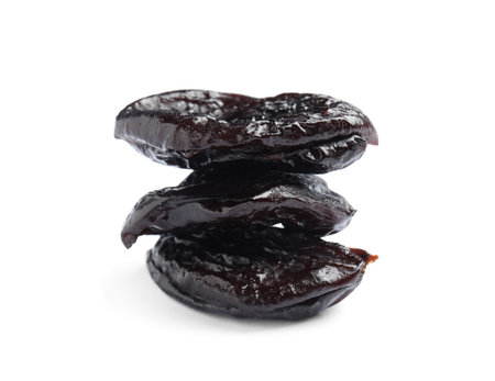Tasty prunes on white background. Dried fruit as a healthy snackの写真素材