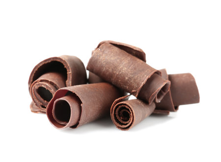 Yummy chocolate curls for decor on white backgroundの写真素材