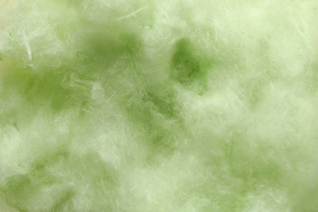 Fluffy yummy cotton candy as background, closeupの写真素材