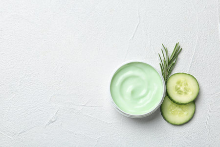 Jar of cream, ingredients and space for text on white background, top view. organic body care productの写真素材