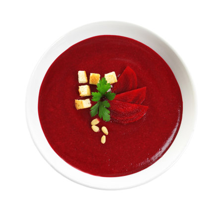 Dish with beet cream soup on white background, top view. healthy foodの写真素材