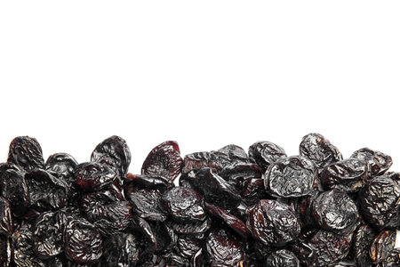 Many tasty prunes on white background, top view with space for text. Dried fruit as a healthy snackの写真素材