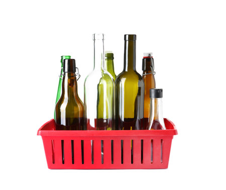 Crate glass bottles on white background. Trash recyclingの写真素材