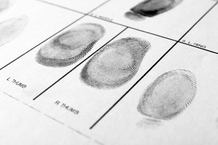 Police form with fingerprints, closeup. Forensic examinationの写真素材