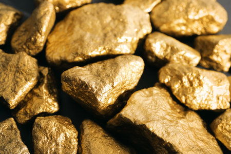 Pile of gold nuggets as background, closeupの写真素材