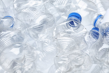 Pile of crumpled plastic bottles as background, closeup. recycling problemの写真素材