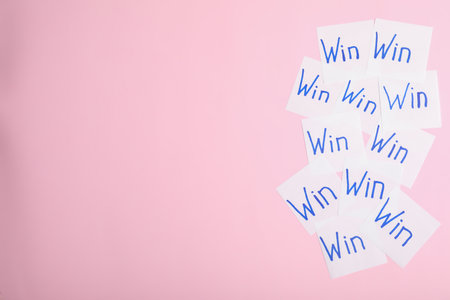 Motivational inscriptions on color background, top view with space for text. Victory conceptの写真素材