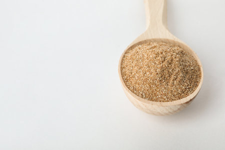 Spoon of buckwheat flour isolated on white. Space for textの写真素材