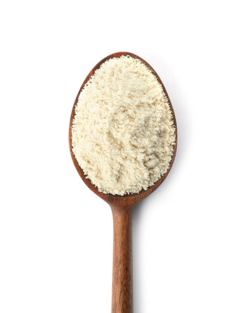 Spoon of sesame flour isolated on white, top viewの写真素材