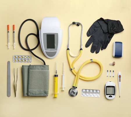 Flat lay composition with medical objects on color backgroundの写真素材