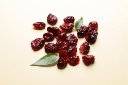 Cranberries on color background. Dried fruit as a healthy snackの写真素材