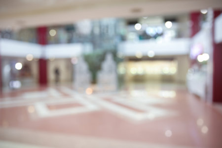 Blurred view of shopping mall entrance hall interiorの写真素材