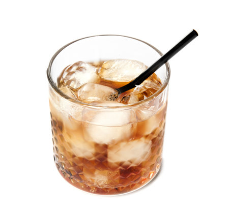 Glass of refreshing cola with ice cubes and straw on white backgroundの写真素材
