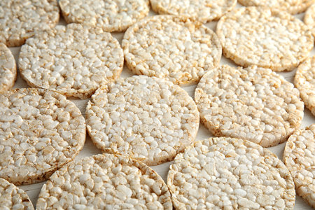 Crunchy rice cakes on white wooden backgroundの写真素材