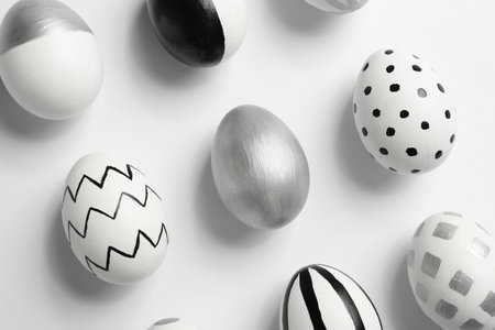 Painted Easter eggs on white background, top viewの写真素材
