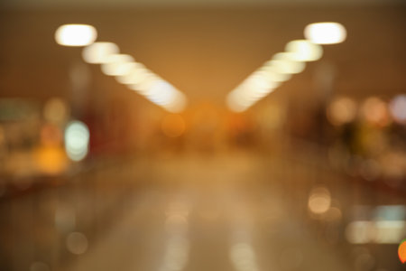 Blurred view of modern shopping mall interior