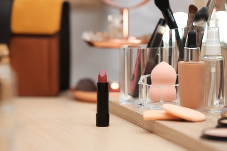 Cosmetic products and makeup accessories on dressing table. Space for textの写真素材