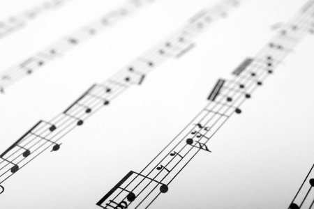 Sheet with music notes as background, closeupの写真素材