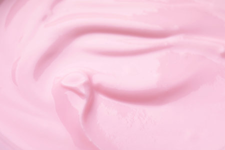 Delicious creamy yogurt as background, closeup viewの写真素材