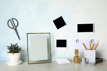 Set of different decorative elements on table against color wall. DIY bloggerの写真素材