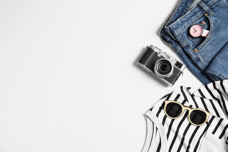 Flat lay composition with wear, camera and space for text isolated on white. fashion bloggerの写真素材
