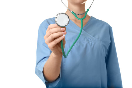 Female doctor with stethoscope on white background, closeup. medical objectの写真素材
