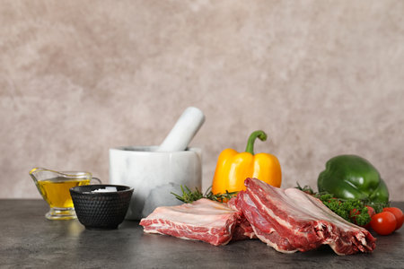 Composition with raw meat on table. Space for textの写真素材