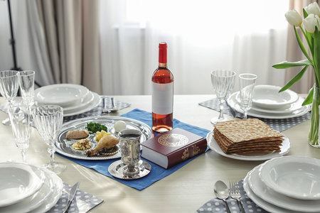 Table served for Passover (Pesach) Seder indoorsの写真素材