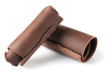 Yummy chocolate curls for decor on white backgroundの写真素材
