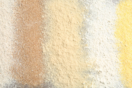 Stripes of different flour types as background, top viewの写真素材
