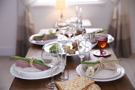 Festive Passover table setting at home. Pesach celebrationの写真素材