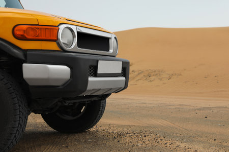 Modern car in desert ready for dune bashing