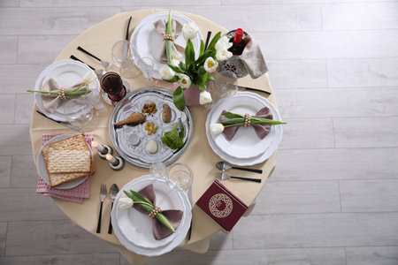 Festive Passover table setting with Torah, top view. Pesach celebrationの写真素材