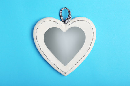 Beautiful decorative heart on color background, top viewの写真素材