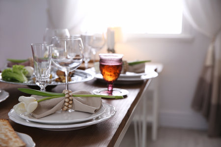Festive Passover table setting at home, space for text. Pesach celebrationの写真素材