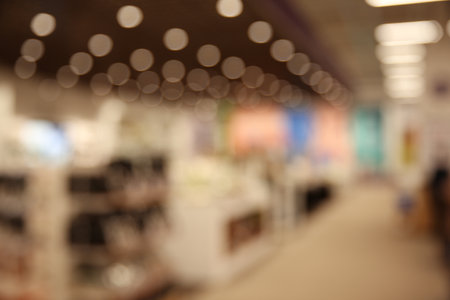 Blurred view of modern shopping mall interiorの写真素材