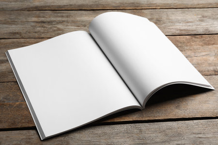 Mockup of open brochure on wooden backgroundの写真素材
