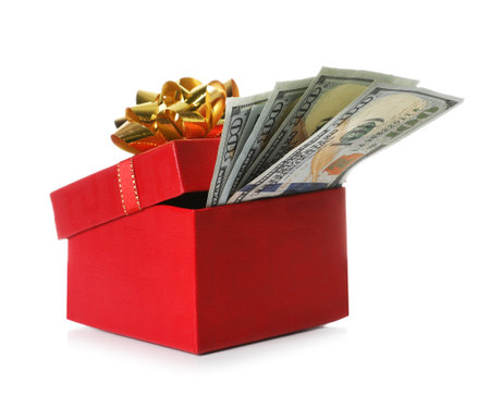 Gift box with dollar banknotes on white backgroundの写真素材