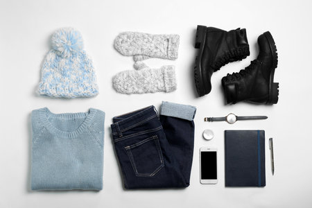 Set of stylish clothes and accessories on white background, flat layの写真素材
