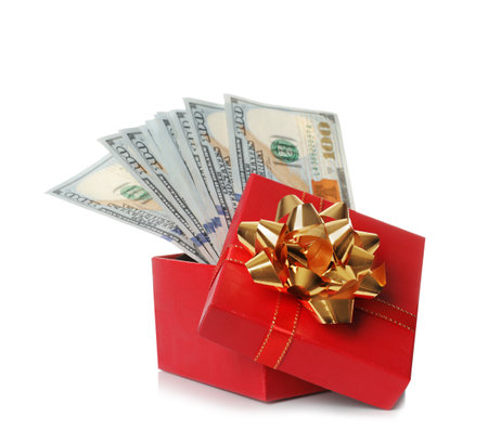 Gift box with dollar banknotes on white backgroundの写真素材