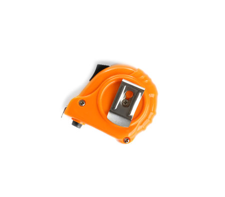 New measuring tape on white background, top view. construction tools