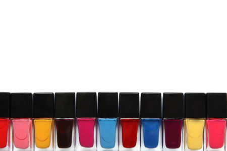 Bottles of nail polish on white background, top viewの写真素材
