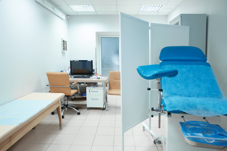 Gynecological clinic interior with chair and doctor's workplaceの写真素材