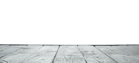 Empty wooden table surface on white background. Mockup for designの写真素材