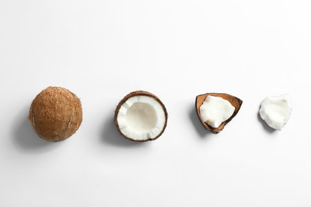 Composition with coconuts on white background, top viewの写真素材