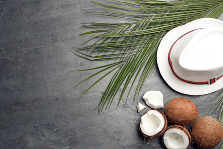Flat lay composition with coconuts and space for text on gray background