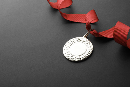 Gold medal with space for design on black background. Victory conceptの写真素材