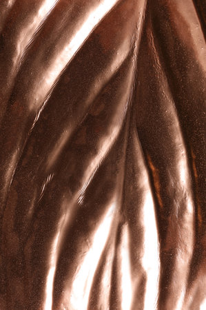 Close up view of rose gold leaf as backgroundの写真素材