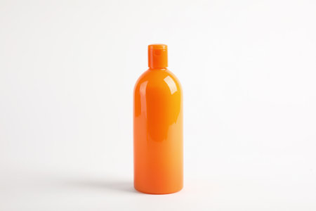 Bottle with sun protection body cream on white backgroundの写真素材