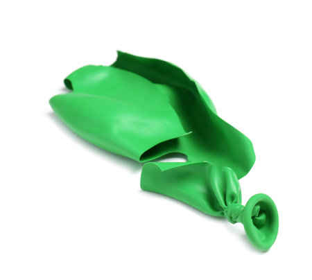 Popped color air balloon on white backgroundの写真素材